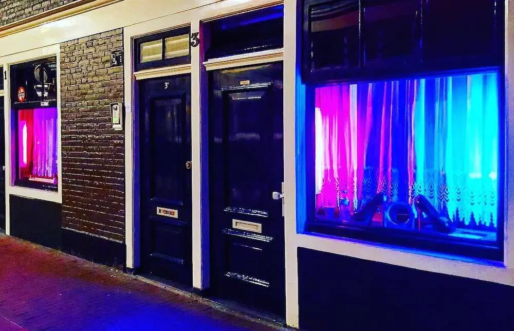 a red light area in amsterdam with blue glass